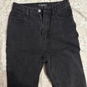 Pretty little thing, size 4 tall black jeans. Slit at bottom of jeans.